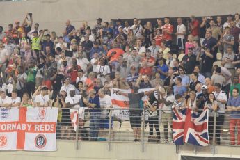 World © Octane Photographic Ltd. Sunday 23rd November 2014. Abu Dhabi Grand Prix - Yas Marina Circuit - Formula 1 Podium. Fans in the grandstand. Digital Ref: 1173CB1D0152
