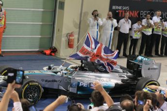 World © Octane Photographic Ltd. Sunday 23rd November 2014. Abu Dhabi Grand Prix - Yas Marina Circuit - Formula 1 Podium. Mercedes AMG Petronas – Lewis Hamilton - Race winner and 2014 World Champion. Digital Ref: 1173CB1D0345