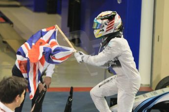 World © Octane Photographic Ltd. Sunday 23rd November 2014. Abu Dhabi Grand Prix - Yas Marina Circuit - Formula 1 Podium. Mercedes AMG Petronas – Lewis Hamilton - Race winner and 2014 World Champion. Digital Ref: 1173CB1D0408