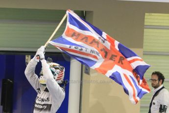 World © Octane Photographic Ltd. Sunday 23rd November 2014. Abu Dhabi Grand Prix - Yas Marina Circuit - Formula 1 Podium. Mercedes AMG Petronas – Lewis Hamilton - Race winner and 2014 World Champion. Digital Ref: 1173CB1D0415
