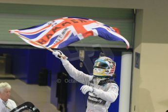 World © Octane Photographic Ltd. Sunday 23rd November 2014. Abu Dhabi Grand Prix - Yas Marina Circuit - Formula 1 Podium. Mercedes AMG Petronas – Lewis Hamilton - Race winner and 2014 World Champion. Digital Ref: 1173CB1D0418