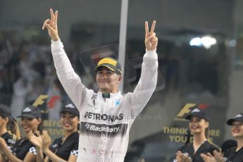 World © Octane Photographic Ltd. Sunday 23rd November 2014. Abu Dhabi Grand Prix - Yas Marina Circuit - Formula 1 Podium. Mercedes AMG Petronas – Lewis Hamilton - Race winner and 2014 World Champion. Digital Ref: 1173CB1D0743