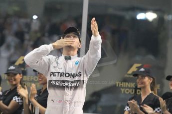 World © Octane Photographic Ltd. Sunday 23rd November 2014. Abu Dhabi Grand Prix - Yas Marina Circuit - Formula 1 Podium. Mercedes AMG Petronas – Lewis Hamilton - Race winner and 2014 World Champion. Digital Ref: 1173CB1D0755