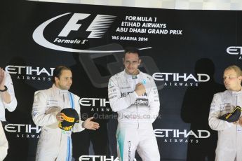 World © Octane Photographic Ltd. Sunday 23rd November 2014. Abu Dhabi Grand Prix - Yas Marina Circuit - Formula 1 Podium. Mercedes AMG Petronas – Lewis Hamilton - Race winner and 2014 World Champion. Digital Ref: 1173CB1D0854
