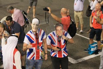 World © Octane Photographic Ltd. Sunday 23rd November 2014. Abu Dhabi Grand Prix - Yas Marina Circuit - Formula 1 Podium. Mercedes AMG Petronas – British Fans on the track. Digital Ref: 1173CB1D0881