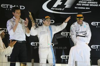 World © Octane Photographic Ltd. Sunday 23rd November 2014. Abu Dhabi Grand Prix - Yas Marina Circuit - Formula 1 Podium. Mercedes AMG Petronas – Lewis Hamilton - Race winner and 2014 World Champion and Williams Racing - Felipe Massa (2nd). Digital Ref: 1173CB1D1039