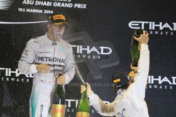 World © Octane Photographic Ltd. Sunday 23rd November 2014. Abu Dhabi Grand Prix - Yas Marina Circuit - Formula 1 Podium. Mercedes AMG Petronas – Lewis Hamilton - Race winner and 2014 World Champion. Digital Ref: 1173CB1D1156