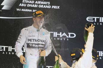World © Octane Photographic Ltd. Sunday 23rd November 2014. Abu Dhabi Grand Prix - Yas Marina Circuit - Formula 1 Podium. Mercedes AMG Petronas – Lewis Hamilton - Race winner and 2014 World Champion. Digital Ref: 1173CB1D1162