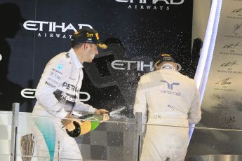 World © Octane Photographic Ltd. Sunday 23rd November 2014. Abu Dhabi Grand Prix - Yas Marina Circuit - Formula 1 Podium. Mercedes AMG Petronas – Lewis Hamilton - Race winner and 2014 World Champion. Digital Ref: 1173CB1D1182