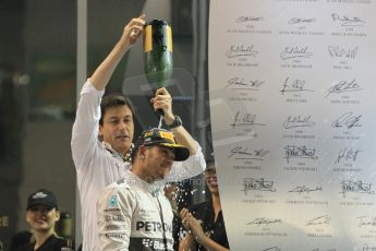 World © Octane Photographic Ltd. Sunday 23rd November 2014. Abu Dhabi Grand Prix - Yas Marina Circuit - Formula 1 Podium. Mercedes AMG Petronas – Lewis Hamilton - Race winner and 2014 World Champion and Williams Racing - Felipe Massa (2nd) and Valtteri Bottas (3rd). Digital Ref: 1173CB1D1271