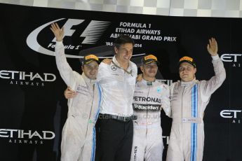 World © Octane Photographic Ltd. Sunday 23rd November 2014. Abu Dhabi Grand Prix - Yas Marina Circuit - Formula 1 Podium. Mercedes AMG Petronas – Toto Wolff and Lewis Hamilton - Race winner and 2014 World Champion and Williams Racing - Felipe Massa (2nd) and Valtteri Bottas (3rd). Digital Ref: 1173CB1D1383
