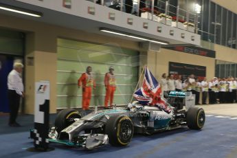 World © Octane Photographic Ltd. Sunday 23rd November 2014. Abu Dhabi Grand Prix - Yas Marina Circuit - Formula 1 Podium. Mercedes AMG Petronas – Lewis Hamilton - Race winner and 2014 World Champion. Digital Ref: 1173LB1D7579