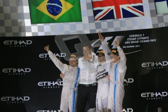 World © Octane Photographic Ltd. Sunday 23rd November 2014. Abu Dhabi Grand Prix - Yas Marina Circuit - Formula 1 Podium. Mercedes AMG Petronas – Toto Wolff and Lewis Hamilton - Race winner and 2014 World Champion and Williams Racing - Felipe Massa (2nd) and Valtteri Bottas (3rd). Digital Ref: 1173LB1DX7721