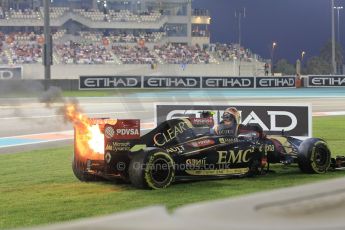 World © Octane Photographic Ltd. Sunday 23rd November 2014. Abu Dhabi Grand Prix - Yas Marina Circuit - Formula 1 Race. Lotus F1 Team E22 on fire – Pastor Maldonado. Digital Ref: