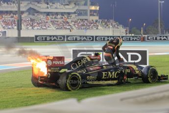 World © Octane Photographic Ltd. Sunday 23rd November 2014. Abu Dhabi Grand Prix - Yas Marina Circuit - Formula 1 Race. Lotus F1 Team E22 on fire – Pastor Maldonado. Digital Ref:
