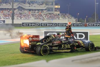 World © Octane Photographic Ltd. Sunday 23rd November 2014. Abu Dhabi Grand Prix - Yas Marina Circuit - Formula 1 Race. Lotus F1 Team E22 on fire – Pastor Maldonado. Digital Ref: