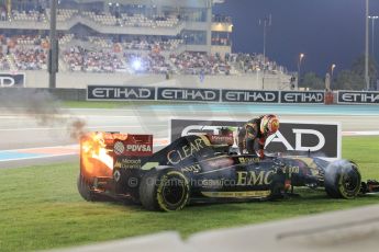 World © Octane Photographic Ltd. Sunday 23rd November 2014. Abu Dhabi Grand Prix - Yas Marina Circuit - Formula 1 Race. Lotus F1 Team E22 on fire – Pastor Maldonado. Digital Ref: