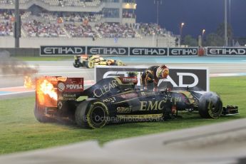 World © Octane Photographic Ltd. Sunday 23rd November 2014. Abu Dhabi Grand Prix - Yas Marina Circuit - Formula 1 Race. Lotus F1 Team E22 on fire – Pastor Maldonado. Digital Ref:
