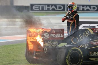 World © Octane Photographic Ltd. Sunday 23rd November 2014. Abu Dhabi Grand Prix - Yas Marina Circuit - Formula 1 Race. Lotus F1 Team E22 on fire – Pastor Maldonado. Digital Ref:
