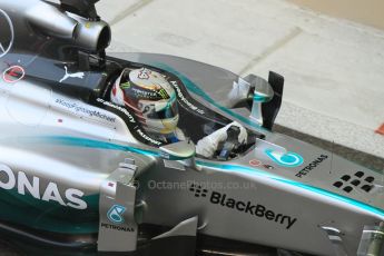 World © Octane Photographic Ltd. Sunday 23rd November 2014. Abu Dhabi Grand Prix - Yas Marina Circuit - Formula 1 Race. Mercedes AMG Petronas F1 W05 – Lewis Hamilton on his out lap from the pits. Digital Ref: