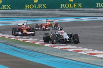 World © Octane Photographic Ltd. Sunday 23rd November 2014. Abu Dhabi Grand Prix - Yas Marina Circuit - Formula 1 Race. McLaren Mercedes MP4/29 - Jenson Button and Scuderia Ferrari F14T – Kimi Raikkonen and Fernando Alonso. Digital Ref:
