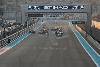 World © Octane Photographic Ltd. Sunday 23rd November 2014. Abu Dhabi Grand Prix - Yas Marina Circuit - Formula 1 Race. Mercedes AMG Petronas F1 W05 – Lewis Hamilton pulls away as Nico Rosberg gets a poor start and fights with the pack on the opening lap. Digital Ref:
