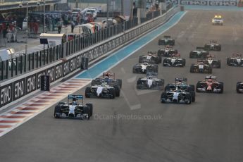 World © Octane Photographic Ltd. Sunday 23rd November 2014. Abu Dhabi Grand Prix - Yas Marina Circuit - Formula 1 Race. Mercedes AMG Petronas F1 W05 Hybrid – Lewis Hamilton pulls away as Nico Rosberg gets a poor start and fights with the pack on the opening lap. Digital Ref: