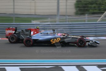 World © Octane Photographic Ltd. Sunday 23rd November 2014. Abu Dhabi Grand Prix - Yas Marina Circuit - Formula 1 Race. McLaren Mercedes MP4/29 - Jenson Button and Scuderia Ferrari F14T – Kimi Raikkonen. Digital Ref: