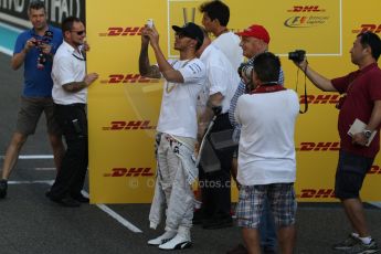 World © Octane Photographic Ltd. Sunday 23rd November 2014. Abu Dhabi Grand Prix - Yas Marina Circuit - Pirelli Fastest Lap award, Lewis Hamilton and Niki Lauda. Digital Ref: