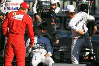 World © Octane Photographic Ltd. Sunday 23rd November 2014. Abu Dhabi Grand Prix - Yas Marina Circuit - End of season Formula 1 Drivers line up, Fernando Alonso, Lewis Hamilton and Nico Rosberg. Digital Ref: