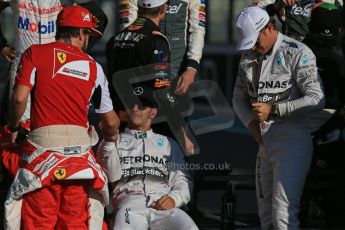 World © Octane Photographic Ltd. Sunday 23rd November 2014. Abu Dhabi Grand Prix - Yas Marina Circuit - End of season Formula 1 Drivers line up, Fernando Alonso, Lewis Hamilton and Nico Rosberg. Digital Ref: