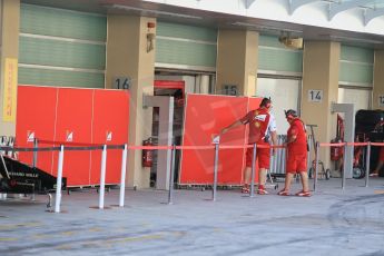 World © Octane Photographic Ltd. Tuesday 25th November 2014. Abu Dhabi Testing - Yas Marina Circuit. Scuderia Ferrari garage with barriers. Digital Ref: 1174CB1D8193
