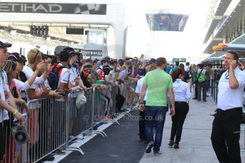 World © Octane Photographic Ltd. 2014 Formula 1 Abu Dhabi Grand Prix, Formula 1 setup, Thursday 20th November 2014. Fans wait in the pit lane for the drivers. Digital Ref : 1154CB7D7793