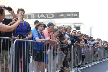 World © Octane Photographic Ltd. 2014 Formula 1 Abu Dhabi Grand Prix, Formula 1 setup, Thursday 20th November 2014. Fans waiting in the pitman. Digital Ref : 1154CB7D7812