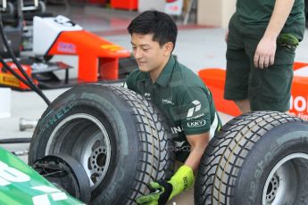 World © Octane Photographic Ltd. 2014 Formula 1 Abu Dhabi Grand Prix, GP2 setup, Thursday 20th November 2014. Rio Haryanto wheel change - EQ8 Caterham Racing. Digital Ref : 1156CB1D5037