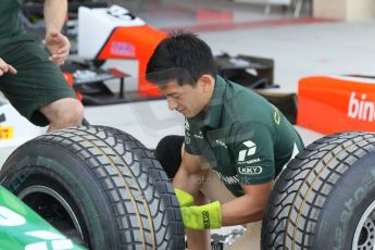 World © Octane Photographic Ltd. 2014 Formula 1 Abu Dhabi Grand Prix, GP2 setup, Thursday 20th November 2014. Rio Haryanto wheel change - EQ8 Caterham Racing. Digital Ref : 1156CB1D5044