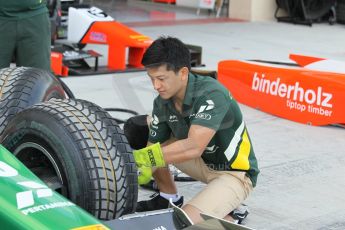 World © Octane Photographic Ltd. 2014 Formula 1 Abu Dhabi Grand Prix, GP2 setup, Thursday 20th November 2014. Rio Haryanto wheel change - EQ8 Caterham Racing. Digital Ref : 1156CB1D5055
