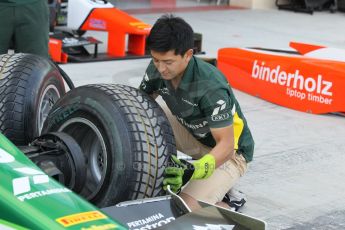 World © Octane Photographic Ltd. 2014 Formula 1 Abu Dhabi Grand Prix, GP2 setup, Thursday 20th November 2014. Rio Haryanto wheel change - EQ8 Caterham Racing. Digital Ref : 1156CB1D5061