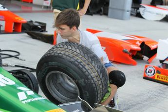 World © Octane Photographic Ltd. 2014 Formula 1 Abu Dhabi Grand Prix, GP2 setup, Thursday 20th November 2014. Pierre Gasly wheel change - EQ8 Caterham Racing. Digital Ref : 1156CB1D5086