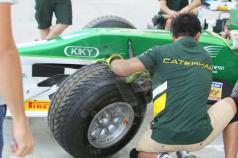 World © Octane Photographic Ltd. 2014 Formula 1 Abu Dhabi Grand Prix, GP2 setup, Thursday 20th November 2014. Rio Haryanto wheel change - EQ8 Caterham Racing. Digital Ref : 1156CB1D5119