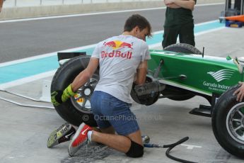 World © Octane Photographic Ltd. 2014 Formula 1 Abu Dhabi Grand Prix, GP2 setup, Thursday 20th November 2014. Pierre Gasly wheel change - EQ8 Caterham Racing. Digital Ref : 1156CB1D5134