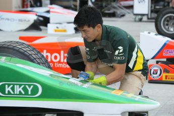 World © Octane Photographic Ltd. 2014 Formula 1 Abu Dhabi Grand Prix, GP2 setup, Thursday 20th November 2014. Rio Haryanto wheel change - EQ8 Caterham Racing. Digital Ref : 1156CB1D5211