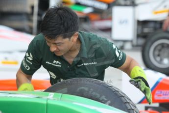 World © Octane Photographic Ltd. 2014 Formula 1 Abu Dhabi Grand Prix, GP2 setup, Thursday 20th November 2014. Rio Haryanto wheel change - EQ8 Caterham Racing. Digital Ref : 1156CB1D5220