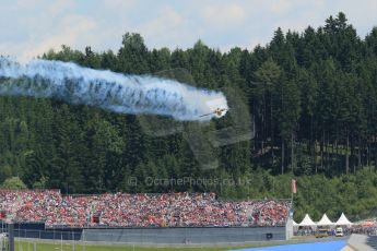World © Octane Photographic Ltd. Sunday 22nd June 2014. Red Bull Ring, Spielberg – Austria, Airshow. Hannes Arch - Red Bull Air Race. Digital Ref: 1002LB1D4820