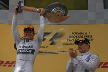 World © Octane Photographic Ltd. Sunday 22nd June 2014. Red Bull Ring, Spielberg - Austria - Formula 1 Podium. Mercedes AMG Petronas - Nico Rosberg and Williams Martini Racing - Valtteri Bottas. Digital Ref: 1001LB1D5829