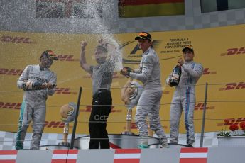 World © Octane Photographic Ltd. Sunday 22nd June 2014. Red Bull Ring, Spielberg - Austria - Formula 1 Podium. Mercedes AMG Petronas - Nico Rosberg and Lewis Hamilton plus Williams Martini Racing - Valtteri Bottas. Digital Ref: 1001LB1D5925