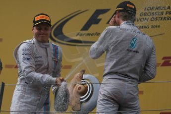 World © Octane Photographic Ltd. Sunday 22nd June 2014. Red Bull Ring, Spielberg - Austria - Formula 1 Podium. Mercedes AMG Petronas - Nico Rosberg and Williams Martini Racing - Valtteri Bottas. Digital Ref: 1001LB1D5963