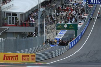World © Octane Photographic Ltd. Sunday 22nd June 2014. Red Bull Ring, Spielberg - Austria - Formula 1 Race. Lotus F1 Team E22 - Romain Grosjean prepares to start from the pitlane. Digital Ref: 1000LB1D4986