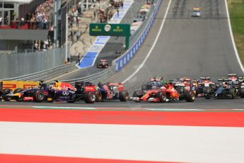 World © Octane Photographic Ltd. Sunday 22nd June 2014. Red Bull Ring, Spielberg - Austria - Formula 1 Race. Mercedes AMG Petronas F1 W05 Hybrid – Lewis Hamilton makes the move stick on Infiniti Red Bull Racing RB10 – Daniel Ricciardo. Digital Ref: 1000LB1D5047