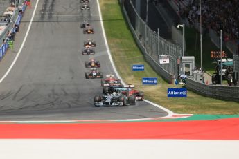 World © Octane Photographic Ltd. Sunday 22nd June 2014. Red Bull Ring, Spielberg - Austria - Formula 1 Race. Mercedes AMG Petronas F1 W05 Hybrid – Lewis Hamilton and Scuderia Ferrari F14T - Fernando Alonso. Digital Ref: 1000LB1D5094
